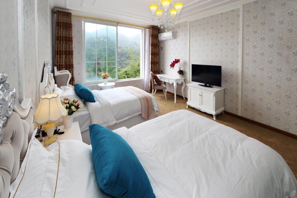 Panshan Tingquan Tuwo Holiday Resort Leshan Δωμάτιο φωτογραφία